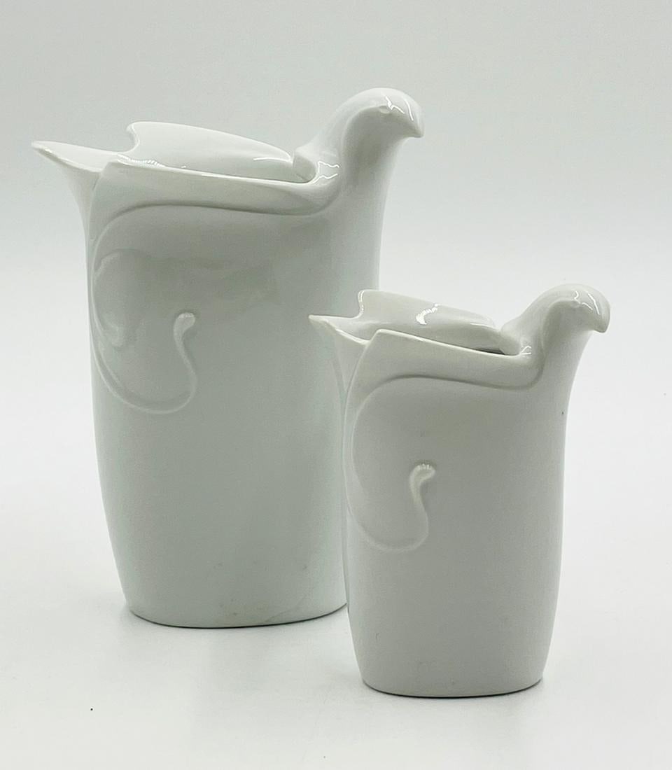 Pair of Porcelain Dove Vases by Dansk, Made in Japan by Gunner Cyren: Dansk International Design white porcelain dove vases, designed by Gunner Cyren, Japan. Measurements: Talle vase. 8 inches high x 6 inches wide x 4 inches wide it appears to have a hairline crack. Sma