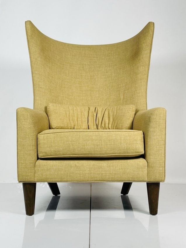 Midcentury Modern Style Wingback Chair made in the USA by Thrive Furniture: Midcentury modern style wingback chair made in Los Angeles by Thrive Furniture. The Piece has beautiful lines and is well made. Measurements: 47 inches high x 34 inches wide x 38.25 inches deep x 18 i