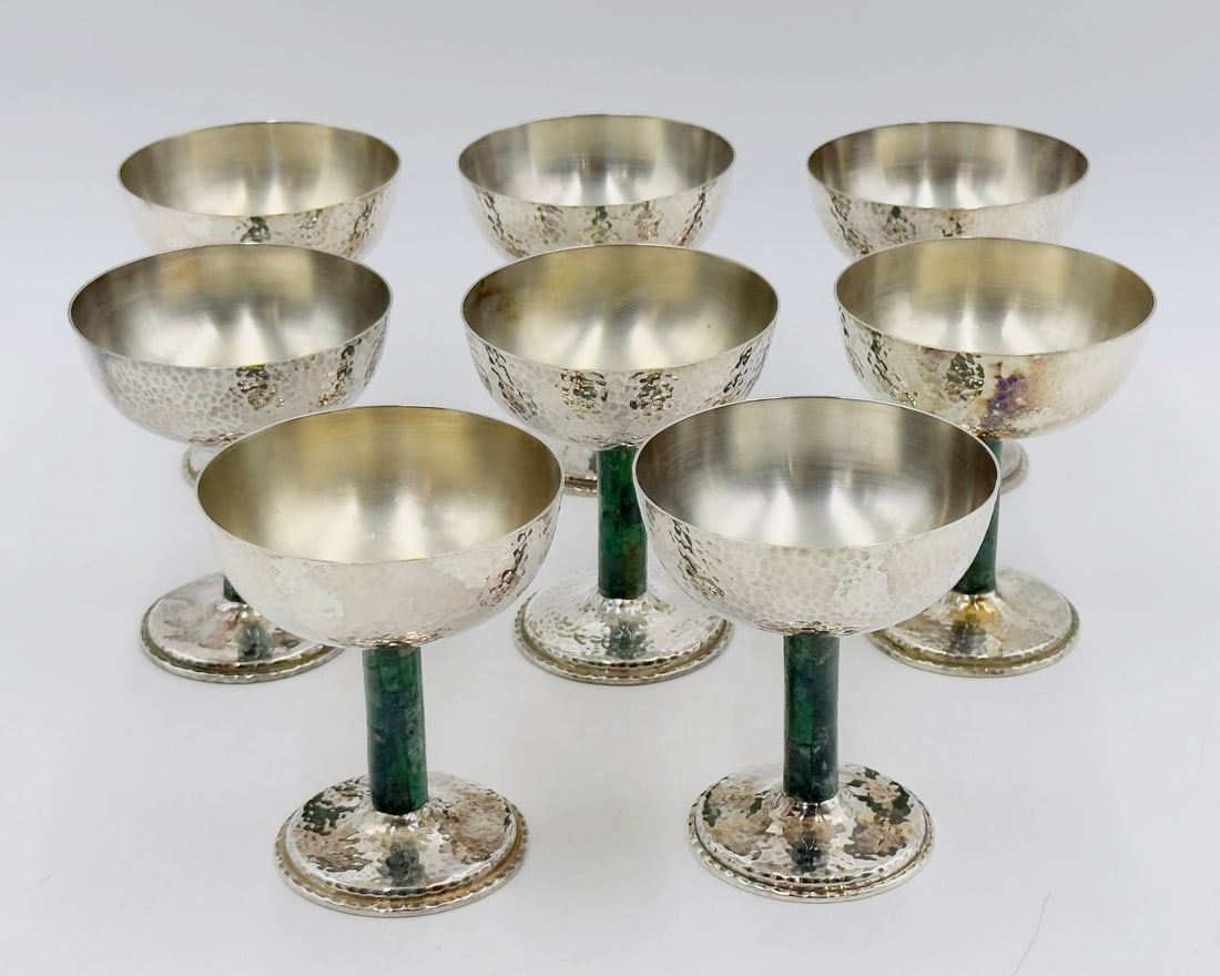 Set of 8 Hammered Silver & Inlaid Malachite Water/Wine Glasses by Los Castillo, Mexico 20th Century: Set of eight hammered silver and inlaid malachite stone water/wine glasses designed and manufactured by Los Castillo silversmiths in Taxco, Mexico in the mid to late 20th century.The pieces have malac