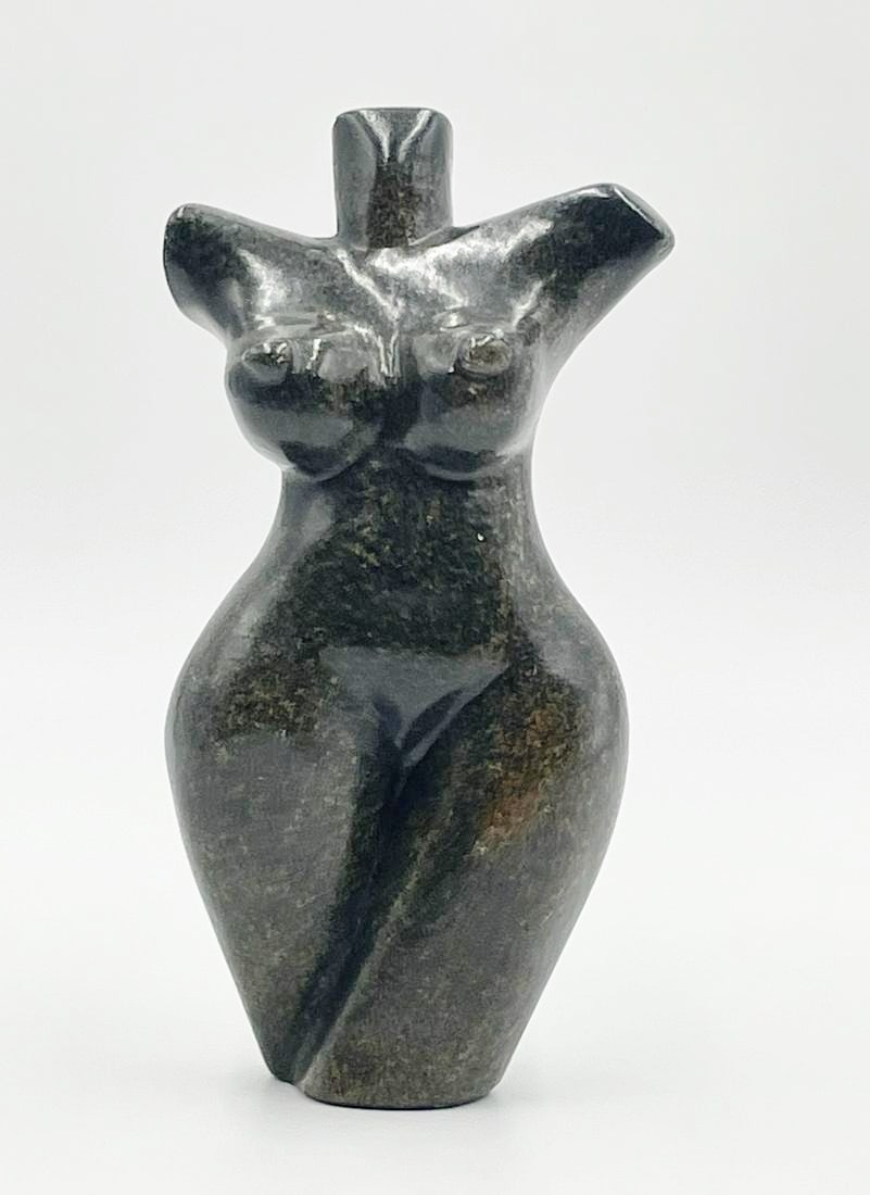 Stunning Soap Stone Female Nude Sculpture, South African: Stunning soapstone sculpture depicting a nude female body, great attention to detail. unsigned. The piece was hand carved in Johannesburg, South Africa. Measurements: 8 inches high x 4 inches wide x 2