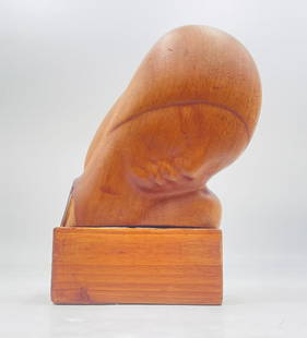 Wooden Head Sculpture After Elizabeth Catlett, Signed E.C.: Vintage wooden head sculpture in the style of Elizabeth Catlett.The piece depicts a female's head and face, signed E.C.The piece also has written A Manoah Et Regine.Measurements; 12 inches high x 8.50