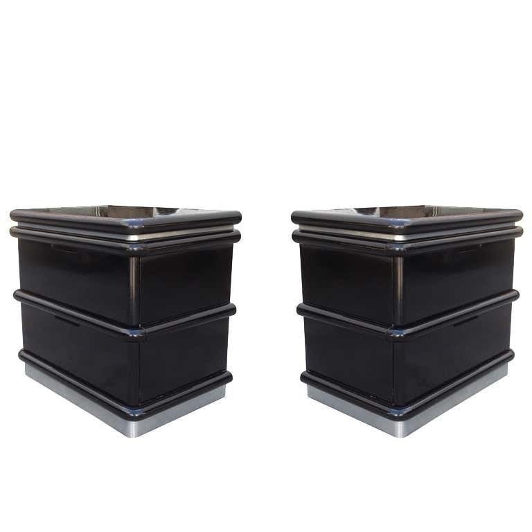 Jay Spectre Nightstands in Black Lacquer & Metal Plinth: Pair of nightstands designed by Jay Spectre and manufactured by Century furniture. The pieces are made in solid wood with an aluminum plinth. Each nightstand has 2 drawers. Measurements: 24 inches wid
