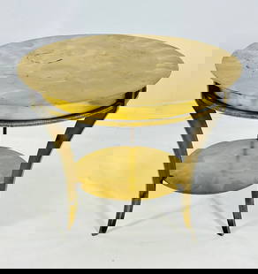 Brass Tone Round Center Table: Beautiful Center table made in solid steel with a brass tone finish.Unmarked.Measurements:28.50 inches in diameter x 24 inches high.Lower shelf: 16 inches in diameter x 8.25 high off the ground.All i