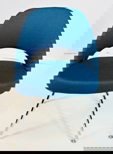 Eero Saarinen Executive Chair for Knoll, Labeled.: Executive armless chair designed by Eero Saarinen and manufactured by Knoll.The chair is upholstered in a blue fabric and chrome legs.The chair was a store display and is fully labeled.Manufactured in