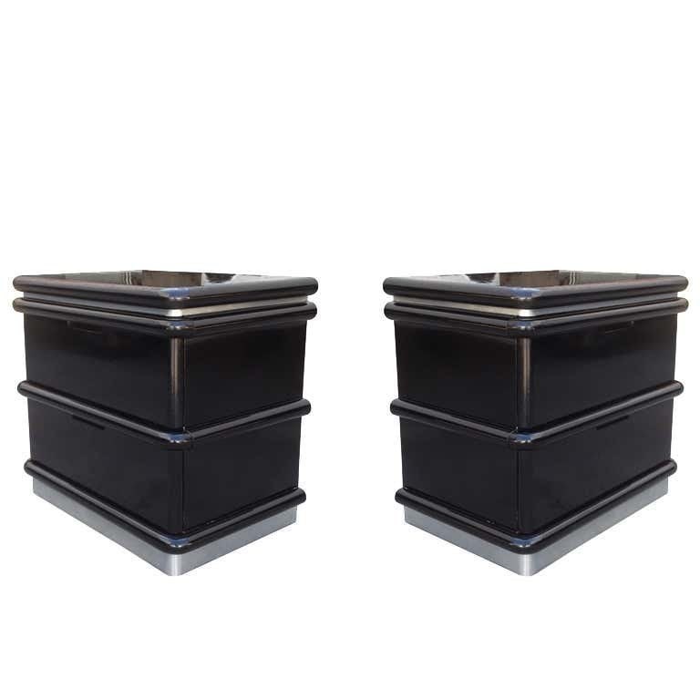 Jay Spectre Nightstands in Black Lacquer & Metal Plinth: Pair of nightstands designed by Jay Spectre and manufactured by Century furniture. The pieces are made in solid wood with an aluminum plinth. Each nightstand has 2 drawers. Measurements: 24 inches wid