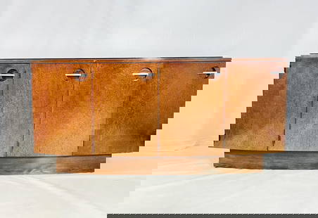 Vintage Sideboard/Buffet by Gilbert Rohde for Herman Miller: Gilbert Rohde for Herman Miller Art Deco mahogany sideboard buffet. Designed in 1937, this buffet features an elegantly curved front façade and plinth base. Behind the two outer doors are found space