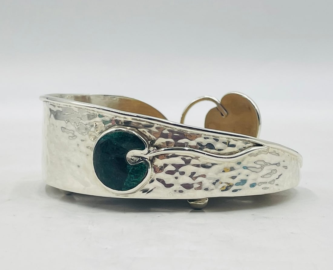 Whimsical Frog Bottle Coaster by Emilia Castillo, Silver Plate & Azurite Inlay: Charming bottle coaster designed by renowned Mexican artisan Emilia Castillo, celebrated for her imaginative motifs and high-quality silverwork rooted in Mexican design traditions. This hand-hammered