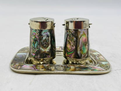 Mexican Alpaca & Abalone Inlay Salt & Pepper Shakers with Tray: A charming and colorful vintage Mexican salt and pepper shaker set, crafted in alpaca silver with richly iridescent abalone shell inlay, complete with a matching tray. Each shaker features a cylindric