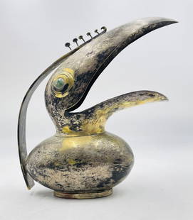 Sculptural Toucan Pitcher with Lapis Lazuli & Azurite Inlay, Attributed to Los Castillo, Taxco: Striking sculptural toucan-form pitcher crafted in silver-plated mixed metal with inlaid lapis lazuli and azurite, attributed to the renowned Los Castillo workshop in Taxco, Mexico. The expressive des