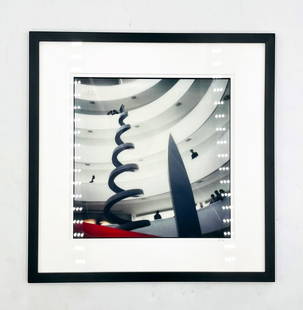 Interior Photograph of the Guggenheim Museum Signed, Jason Katims Private Collection: A framed black and white photograph featuring the interior of the Solomon R. Guggenheim Museum in New York City. The photograph captures the museum's distinctive spiral ramp design, with visitors visi