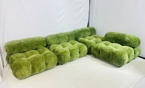 Four Piece Modular Sofa in Green Velvet and Tufted Seats: This sculptural seating system features four individual pieces including seats and backs, upholstered in lush green velvet. The design is celebrated for its bold, organic form with deep tufting and ch