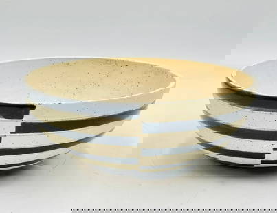 Vintage Ceramic Bowl in the style of Harrison McIntosh (American 1914-2016): Cream colored bowl with black bands around. Apparently unmarked. Measurements: 10.50 inches in diameter x 4 inches high. All items are sold as is. The auction house does not warrant authenticity on an