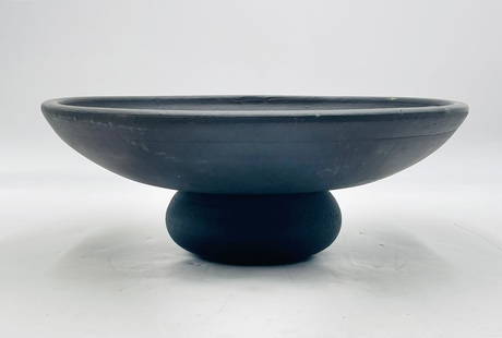 Black Terracotta Bowl by Amber Lewis for Four Hands: Four Hands brings their exceptional craftsmanship to a timeless collection rooted in Amber Lewis' perennial California style. Shallow and wide, this modern bowl creates a fresh perspective on a table