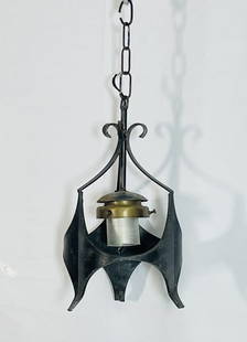 Vintage Wrought Iron Hanging Lantern Pendant with Brass Details: A striking vintage hanging lantern pendant crafted from hand-forged wrought iron with elegant scrollwork and architectural lines. This unique fixture features a cylindrical socket holder with a brass