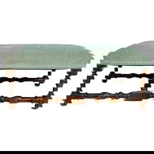 Polo Ralph Lauren Turned Wood Bench with Green Upholstered Seat: A refined bench or ottoman by Polo Ralph Lauren, featuring a finely turned hardwood frame with rich patina and a stretcher base for added stability and visual interest. The rectangular seat is upholst