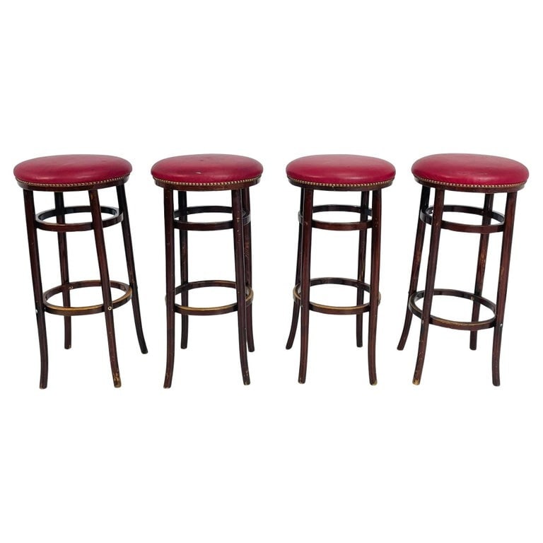 Set of Five Barstools by Michael Thonet for Thonet Furniture, USA 1960's: Offered here is a vintage set of four matching bar stools by Thonet, known for their quality bentwood furniture. These stools feature sturdy wood frames with gracefully curved legs and circular footre