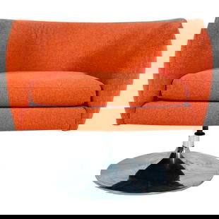 Swivel Lounge Chair by Joseph D'Urso for Knoll, Signed, USA 2009: The Swivel Lounge Chair by Joseph D'Urso for Knoll is a stunning piece of American design from 2009. This signed chair features a vibrant orange fabric on the back, adding a pop of color to any space.