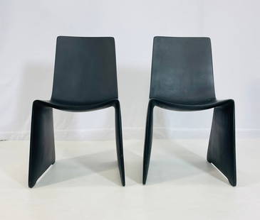 Pair of "Positano" Black Foundry Dining Chairs by Patrick Naggar for Ralph Pucci: A sculptural and refined pair of "Positano" dining chairs designed by Patrick Naggar for Ralph Pucci International. Crafted in black composite resin with a matte foundry finish, these chairs exemplify