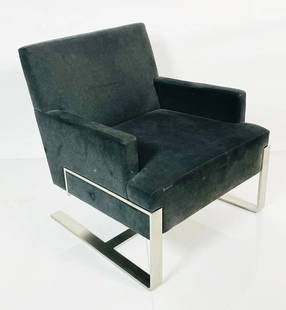 Cantilever Lounge Chair With Steel Base by HB: Beautiful cantilever armchair designed and manufactured in the USA BY HBF.The chair is well designed and executed.Measurements:30 inches high x 29.25 inches wide x 30 inches deep x 16 inches seat heig