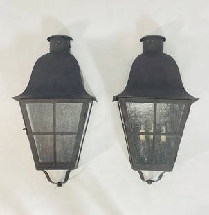 Pair of Old Stock Wall Sconces by Paul Ferrante: Pair of wall sconces designed and manufactured in Los Angeles by Paul Ferrante. The pieces are the same on the outside however the the light sockets are different, one only has one light socket for