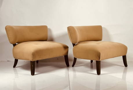 Pair of Mid-Century Modern Slipper Chairs in the style of Billy Haines: Beautiful pair of lounge chairs with exaggerated curves and low deep seats in the style of Billy Haines.Measurements:26 inches high x 31 inches wide x 32 inches deep x 15 inches seat height.All items