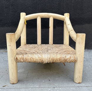 Lounge Chair in the Style of Michael Taylor: Style of the Douglas lounge chair designed by Michael Taylor.The chair is constructed of a white washed frame and a rush seat, no cushions.Unmarked.Measurements:31.50 inches high x 31 inches wide x 31