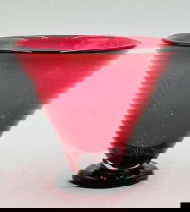 Hand Blown Studio Glass Vase by Correia Glass, Signed & Dated 2005: Beautiful hand blown studio glass vase designed and manufactured by Correia Glass. The piece has a beautiful pink body with a dark round base. The vase is signed and dated 2005. Measurements: 5.75