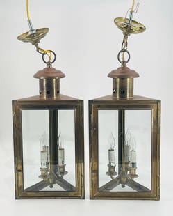 Pair of Vintage Brass & Glass Pendant Lights: Pair of vintage Brass & Glass pendant lights.Triangular shape, each having 3 light bulbs.Marked Luminaire.Measurements:25.50 inches from bottom to the ceiling canopy (height can be adjusted by adding