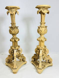 Pair of 59 Inches Tall Carved Pedestals by Paul Ferrante: Pair large wooden pedestals designed and manufactured in Los Angeles, California by Paul Ferrante. Thepieces are heavily carved and are stunning pieces of work. The pieces came straight from the