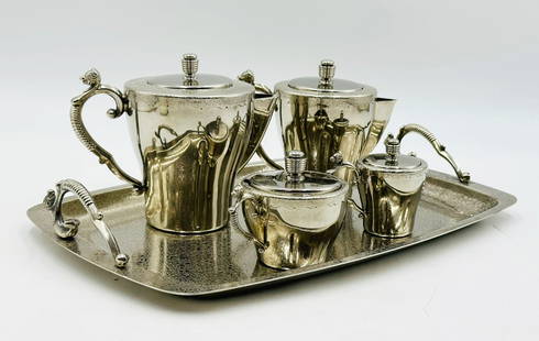 Vintage Japanese Coffee/Tea Service With Sea Horse Handles: Vintage coffee/tea service designed and manufactured in Japan in the late 60s, early 70s.The all of the pieces have beautiful handles shaped as sea horses.The set consist of a coffee pot, a tea pot, a