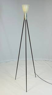 "Rosy" Tripod Floor Lamp by Philippe Stark for Flos: Beautiful tripod floor lamp designed by Philippe Stark and manufactured by Flos. The lamp is part of the Rosy collection and is fully functional. The piece retains the Flos label. Measurements: