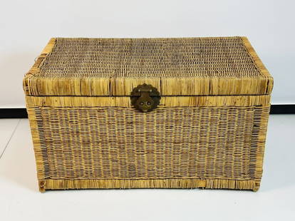 1970s Vintage Wicker Truck Chest with Brass Hardware: 1970s large scale wicker Asian style storage trunk chest. Features raised wood feet and etched Asian motif hardware. Measurements: 36 inches wide x 20 inches deep x 20.50 inches high. All items