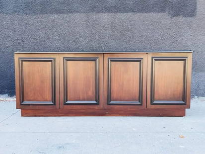 Vintage Sideboard/Credenza, Walnut Wood with Black Trim.: Vintage sideboard/credenza in walnut wood finish and black trimming.The cabinet has 2 compartments with an adjustable shelf on each side.Unmarked.Measurements:80.75 inches wide x 20.50 inches deep x 3