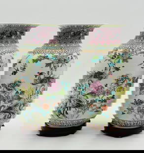Matched Pair of Chinese Jingdezhen Famille Rose Porcelain Vases: A matched pair of Chinese Famille Rose Jingdezhen vases with enameled decoration in pink and green, depicting a peacock on rockery and peony branch. The reverse of both vases inscribed with calligraph