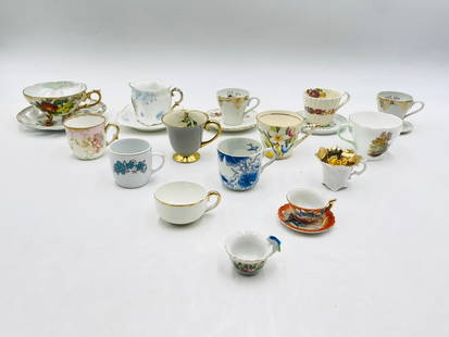 A Collection of 15 Vintage Porcelain Tea Cups & 6 Saucers,: Stunning collection of 15 vintage porcelain tea cups and 6 porcelain saucers. Some of them with 22k gold details and hand painted accents. Some pieces are labeled some aren't, most are made in differe