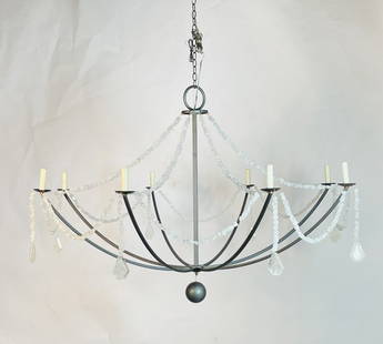Quartz Crystal Drape Chandelier by Low Country 60 Dia x 116 High: The Lowcountry Originals Crystal Nugget Drape Chandelier is handcrafted with raw steel and designed with intricate strands of translucent quartz crystal. Each crystal strand ends with a quartz