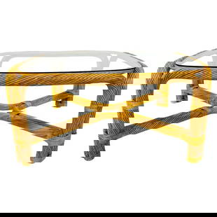 Vintage Twisted Rattan Coffee Table With Glass Top: Beautiful coffee table designed and manufactured in the United States in the 1960s.The table is made out of pencil thin rattan material with a glass top.Measurements: 35.50 inches wide x 35.50 inches
