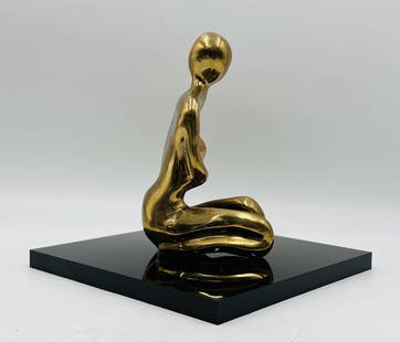 Figurative Bronze Sculpture of A Kneeling Figure on a Lucite Base, Signed.: Vintage figurative bronze sculpture seating on top of a Lucite base.The piece is signed by the artist but the signature is not legible.Measurements:10 inches high x 10 inches square. Sculpture alone a