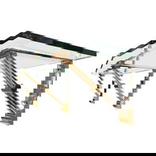Brass and Stainless Steel Wall Shelf attb to Karl Springer: Introducing the Brass and Stainless Steel Wall Shelf in the style of Karl Springer - the perfect blend of functionality and style. Crafted from high-quality glass and metal, this wall shelf is designe