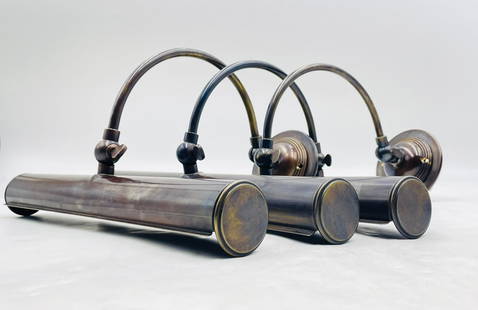 Set of Mid Century Style 3 Wall Sconces in Antique Brass: Beautiful set of 3 solid brass wall lights or sconces in the midcentury modern style. The pieces have an adjustable shade and they are perfect fore reading or art lights. Measurements: 14 inches