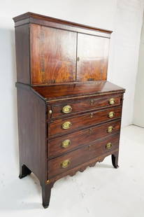 English Regency Two Piece Dresser Cabinet With Brass Hardware: Beautiful English Regency style two piece dresser cabinet with brass hardware. The bottom part has 4 large drawers and a dropdown felted plank. The top part of the cabinet which comes off for