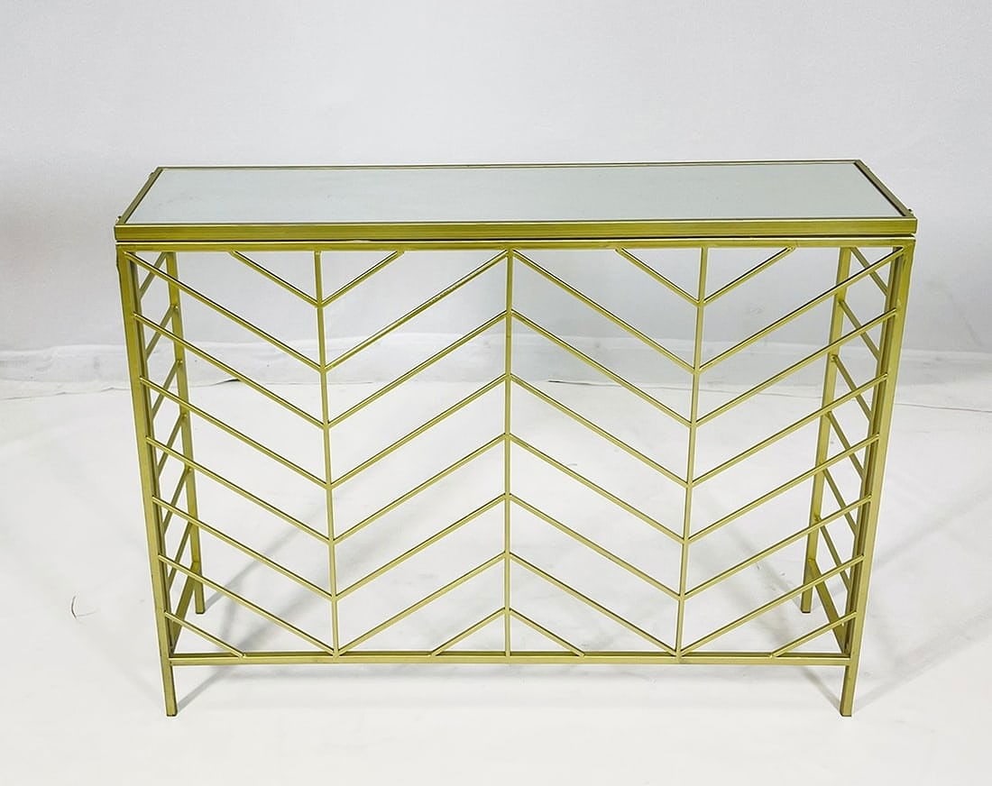 Modern Console Table with Metal Frame and Glass Top: Modern Console Table with Metal Frame and Glass Top Unmarked. Measurements: 39 inches wide x 9.75 inches deep x 29.50 inches high. All items are sold as is. The auction house does not warrant authenti