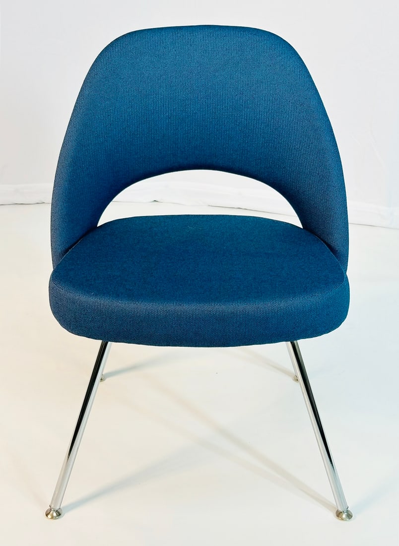 Eero Saarinen Executive Chair for Knoll, Labeled.: Executive armless chair designed by Eero Saarinen and manufactured by Knoll.The chair is upholstered in a blue fabric and chrome legs.The chair was a store display and is fully labeled.Manufactured in