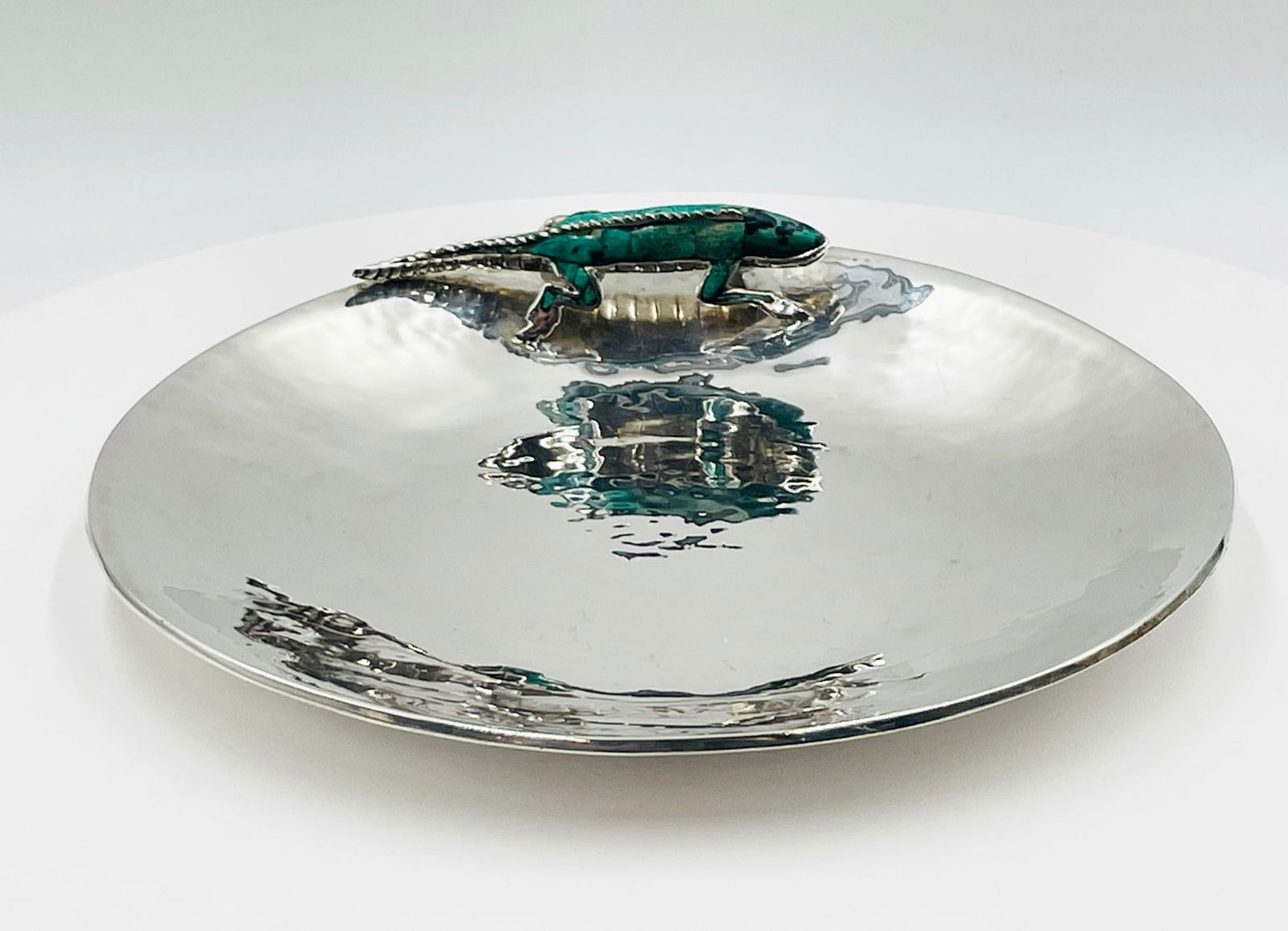 Emilia Castillo Silver-Plated Platter with Malachite Lizard, Signed: Sculptural silver-plated platter by Emilia Castillo (Mexico), accented with a three-dimensional lizard set with malachite inlay that crawls along the rim—an iconic Castillo motif that brings a livel