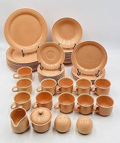 50 Piece Dinnerware, Creamer, Sugar Pot, Salt & Pepper Shakers by Nancy Calhoun, Japan: Vintage Nancy Calhoun Light Peach Ceramic Dishware Dinnerware manufactured in Japan. The set consist of 9 dining plates, 5 salad plates, 11 soup bowls, 10 saucer plates, 11 coffee/tea cups, 1 creamer,