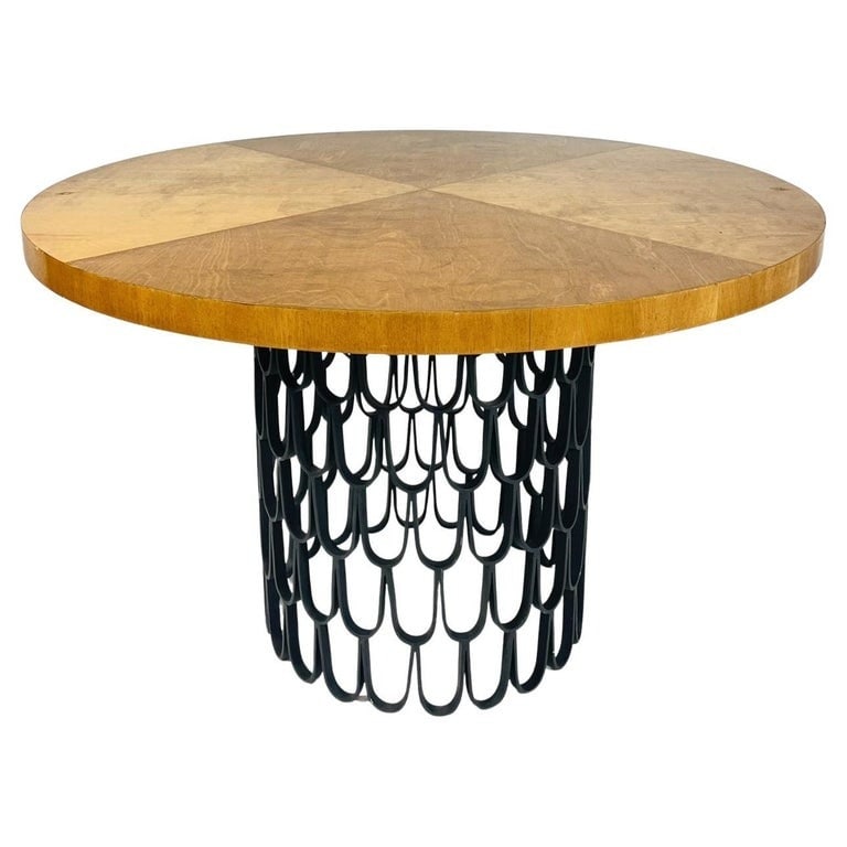 Vintage Round Dining Table in the Style of Paul Evans & Phillip Lloyd Powell: Vintage round table with a round wood top and solid steel round base in the style of Paul Evans & Phillip Lloyd Powell.The base is made our of solid steel with a black finish.Unmarked.Measurements:47