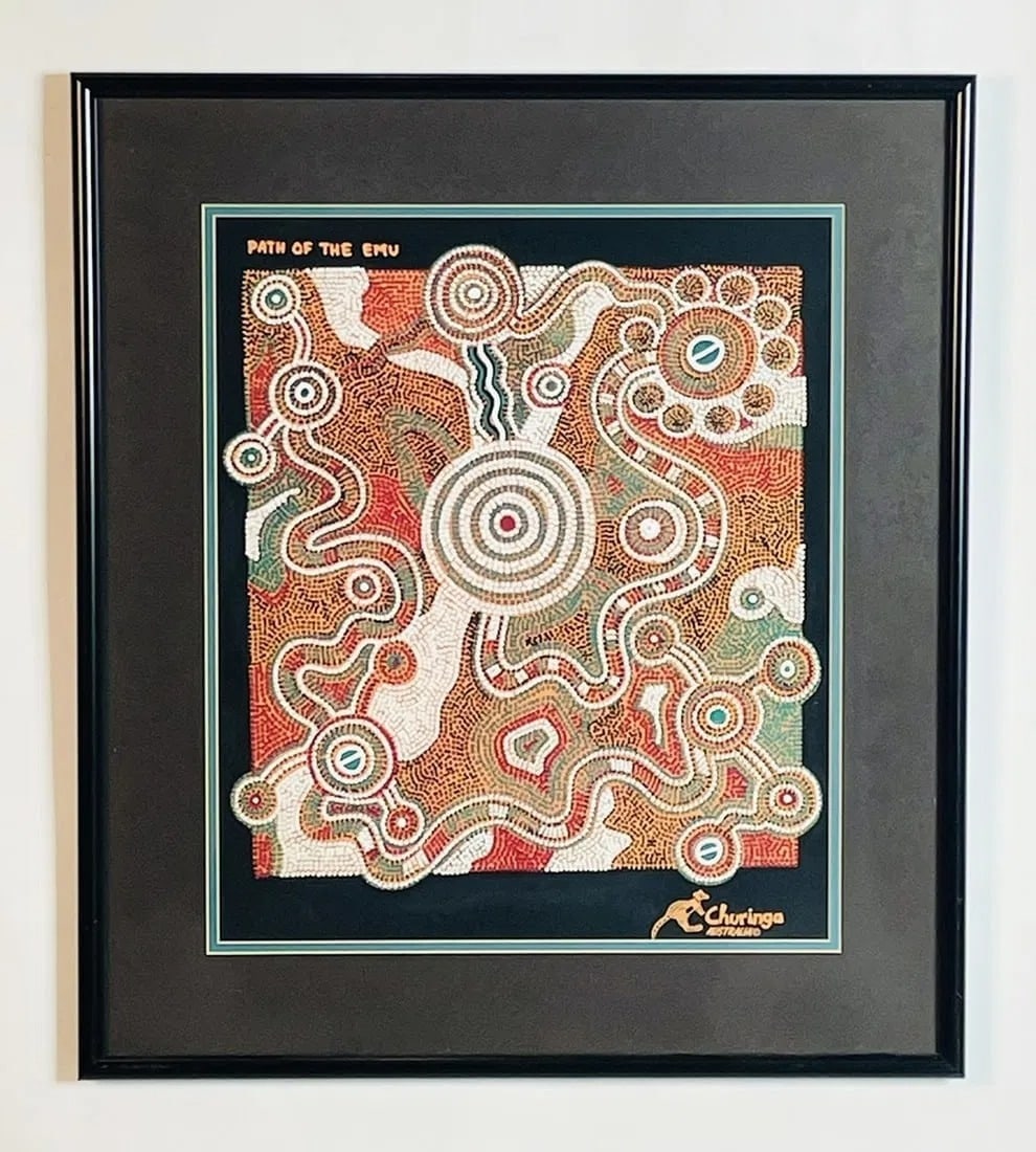 Australian Aboriginal Art Titled 'Path of the Emu' Churinga Australia: Unique aboriginal art from Australia. The piece is done in fabric and it comes framed. Measurements: 25 inches high x 22 inches wide x 1 inch deep/ projection from the wall. All items are so