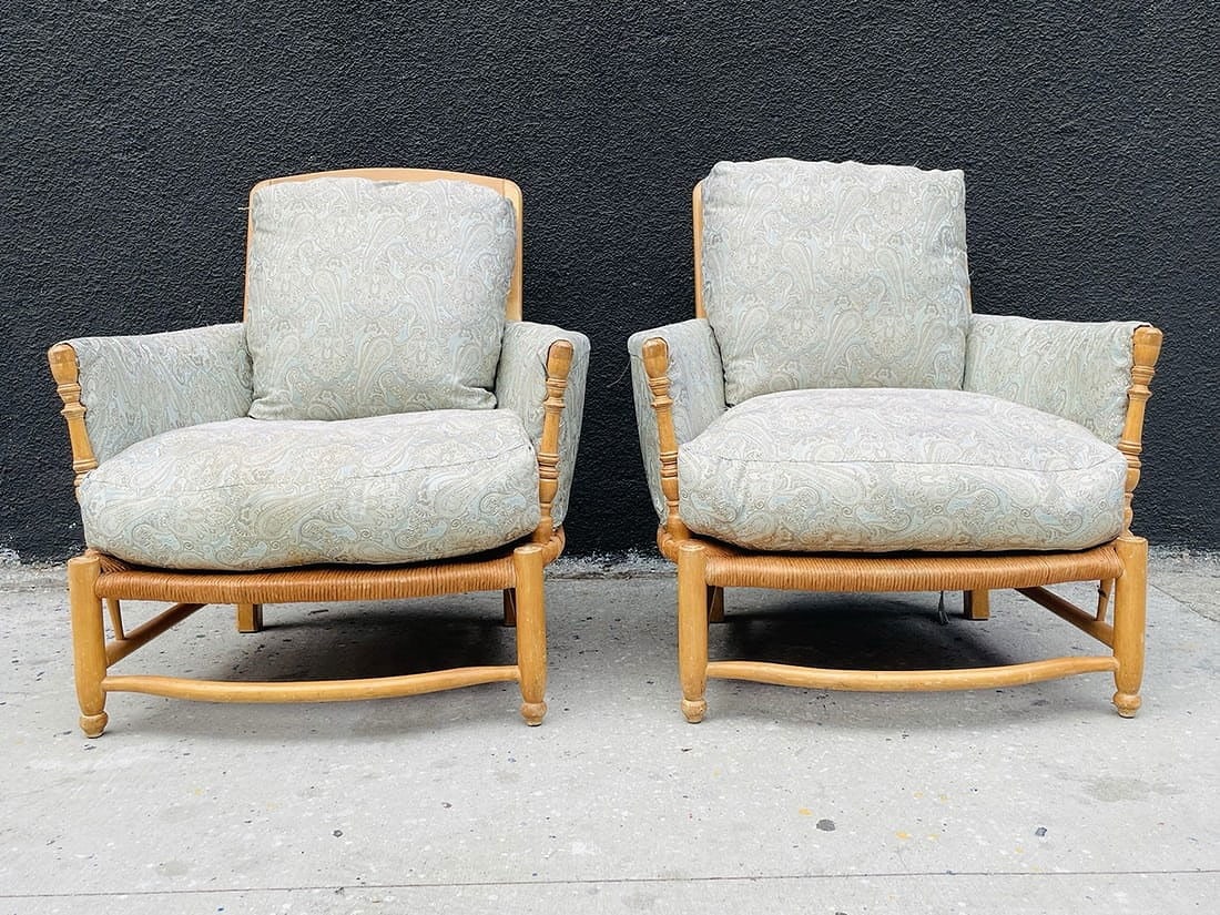 Pair of Country Rush Lounge Chairs by Charles Pollock Reproductions: Large pair of Lounge chairs made in Los Angeles by Charles Pollock Reproductions Inc. Measurements: 33.50 inches wide x 38 inches deep x 37.25 inches high x 17 seat height x 23.50 inches arm height.