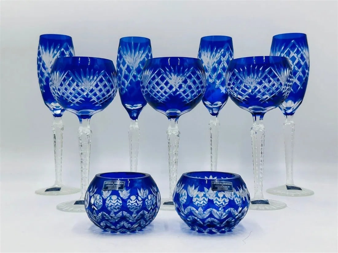 9 Piece Set of Cobalt Blue Crystal Glassware by Godinger -Crystal Legends-: Set of 9 pieces of cobalt blue crystal glassware by Godinger and part of the Crystal Legends collection.The set consist of 4 champagne glasses, 3 wine glasses and 2 round bowls.All labeled and the set