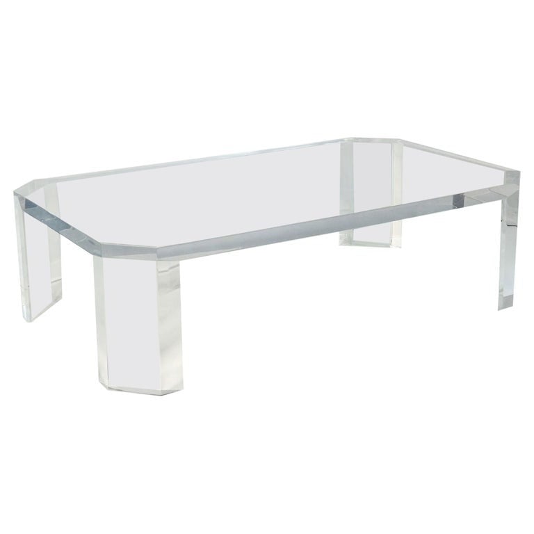 L'Ami Coffee Table in 2' Solid Lucite by Charles Hollis Jones, Signed: "L'AMI" coffee table designed and manufactured in the USA by Charles Hollis Jones (American 1945-), model 505 made out of 2 inches thick Lucite. The table is just stunning, the way the Lucite is plac